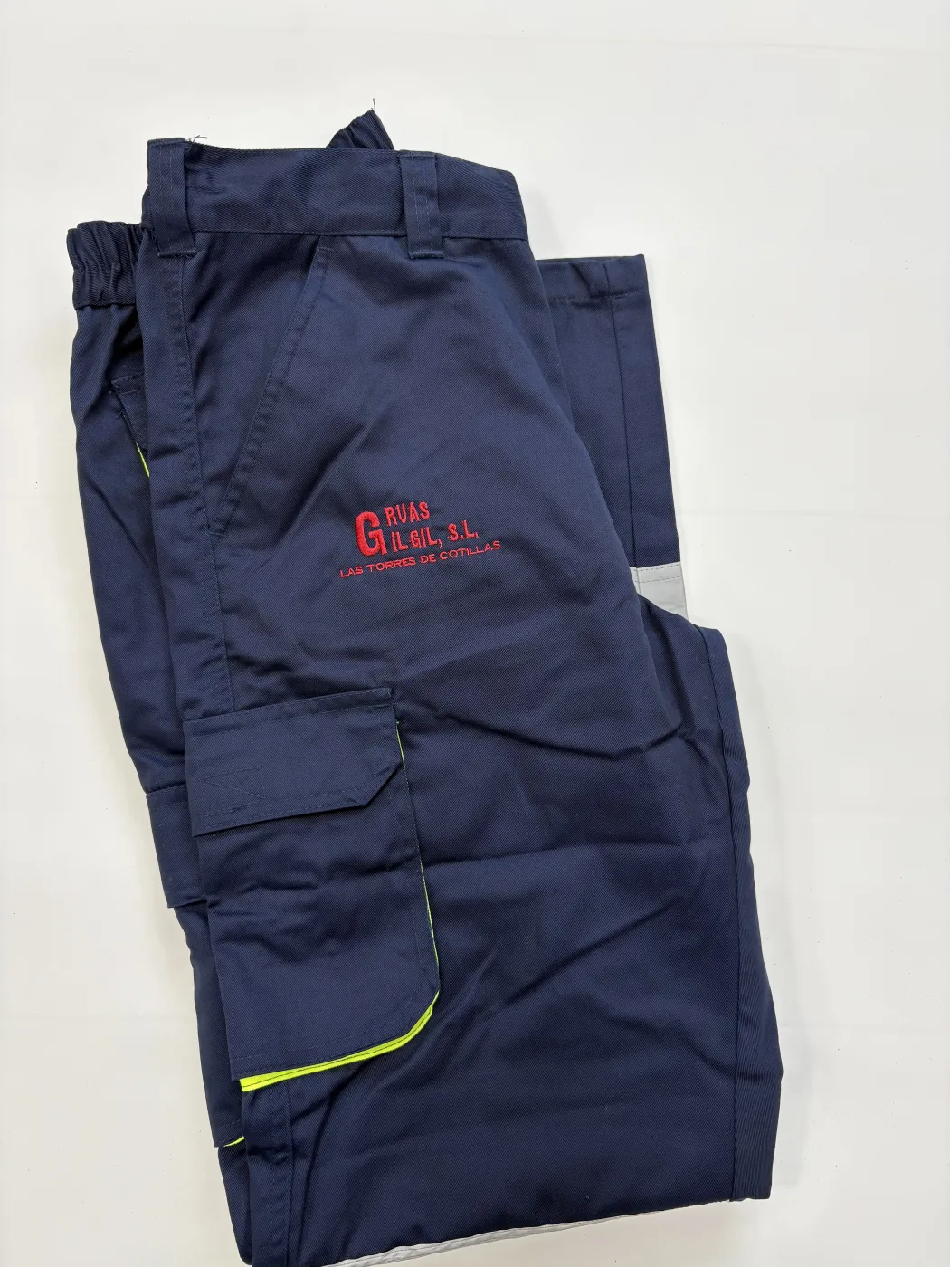 Pantalón de ropa laboral azul marino personalizado con logotipo bordado rojo